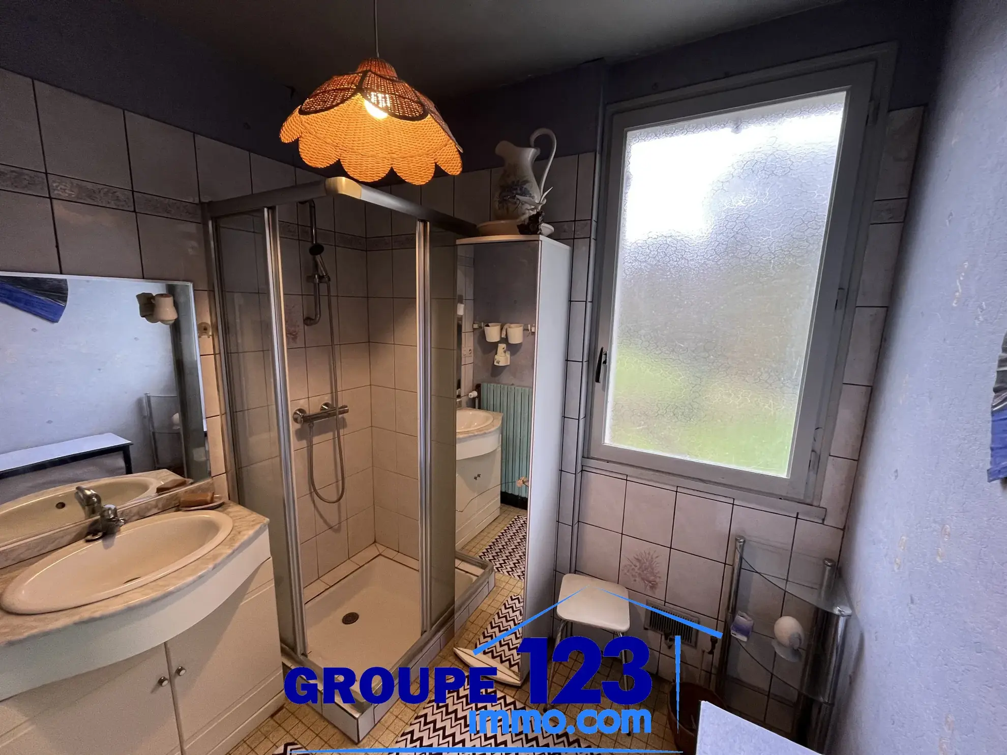 À vendre à Auxerre : pavillon avec sous-sol et terrain spacieux de 1009 m² 