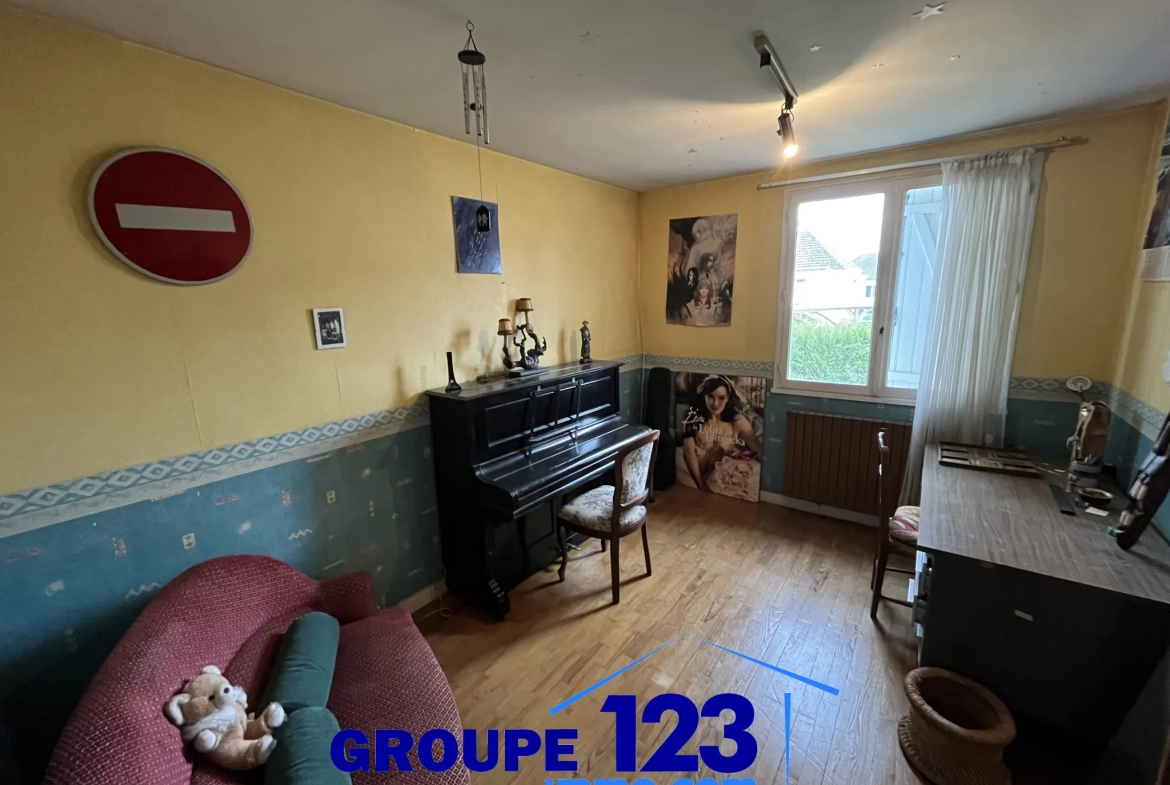 À vendre à Auxerre : pavillon avec sous-sol et terrain spacieux de 1009 m² 