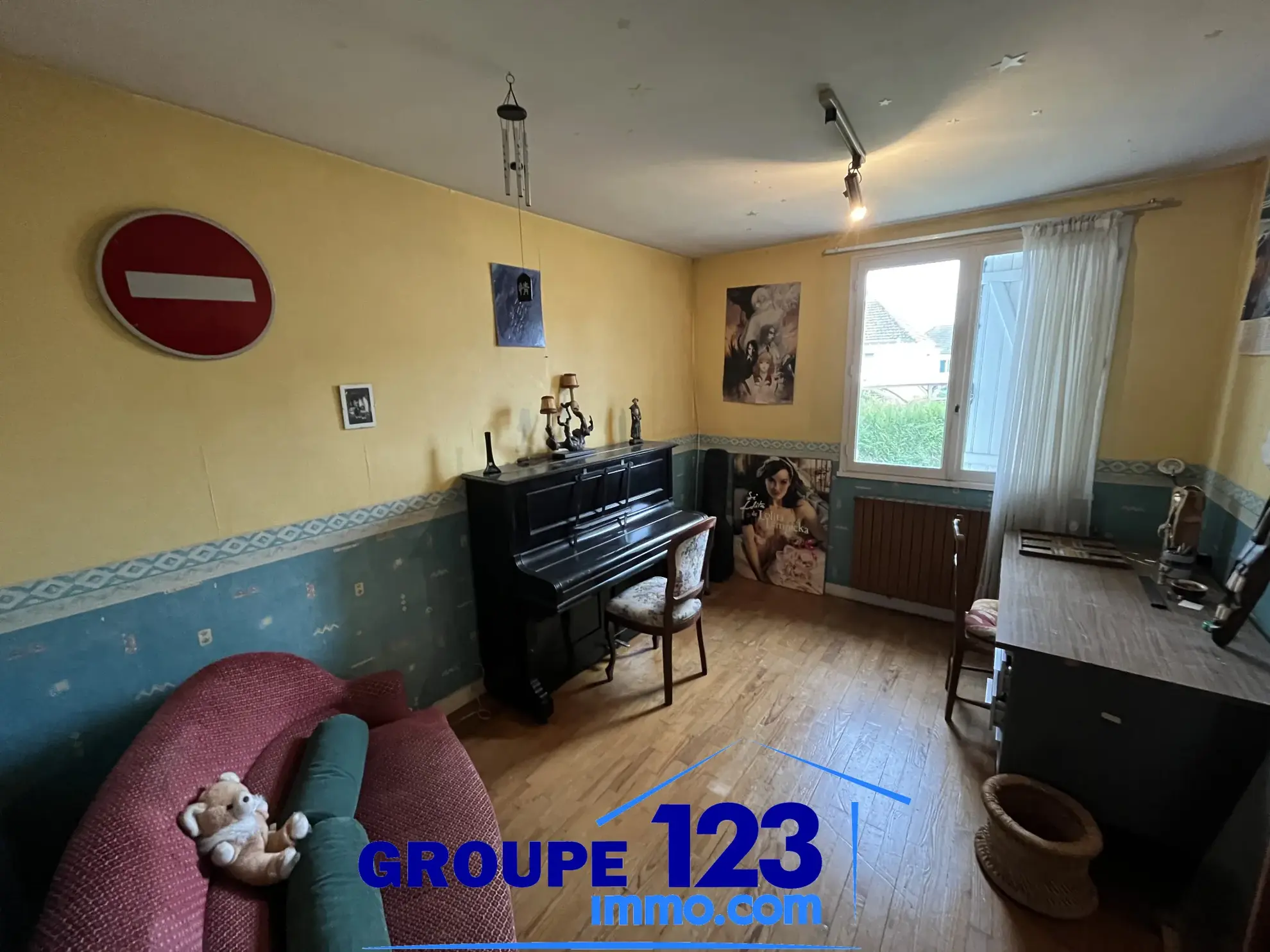 À vendre à Auxerre : pavillon avec sous-sol et terrain spacieux de 1009 m² 