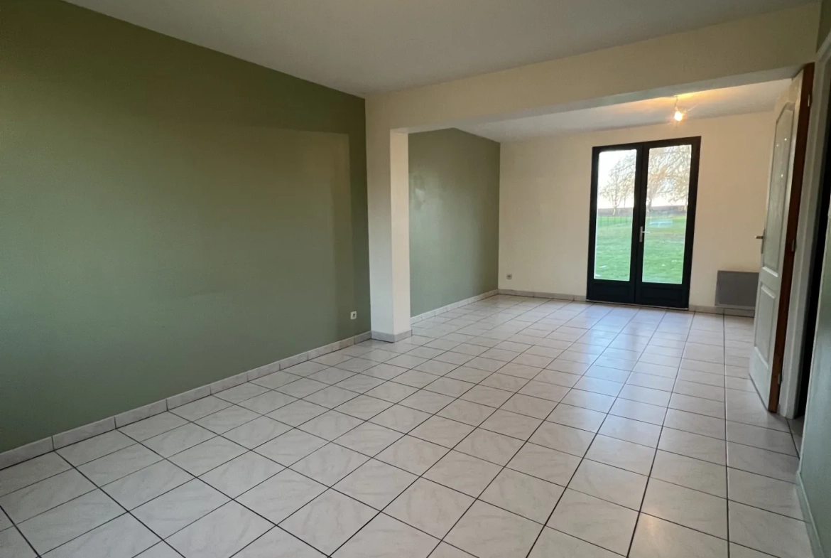Maison individuelle à Bucquoy de 110 m² avec jardin, garages et 4 chambres - Vente dans le Pas-de-Calais 