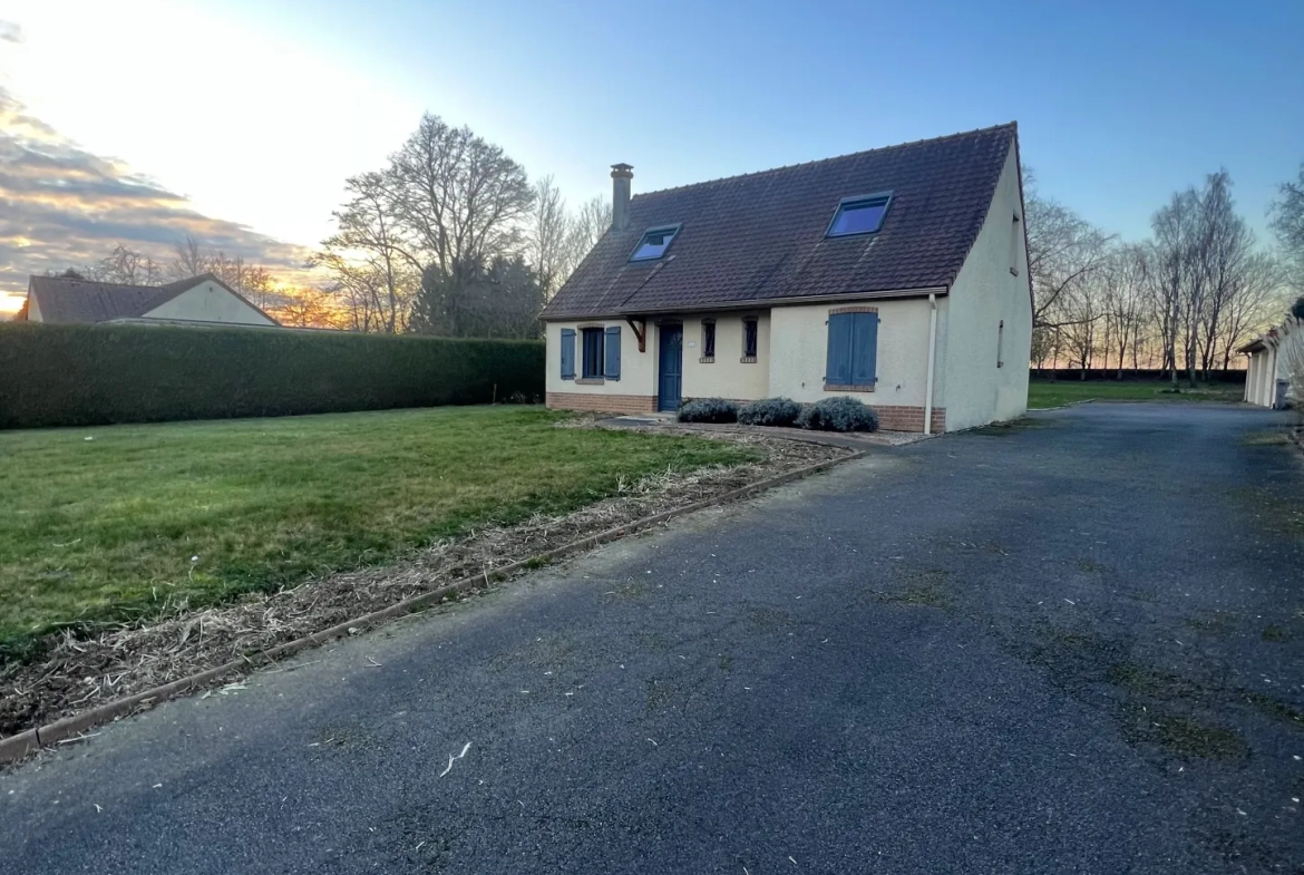 Maison individuelle à Bucquoy de 110 m² avec jardin, garages et 4 chambres - Vente dans le Pas-de-Calais 