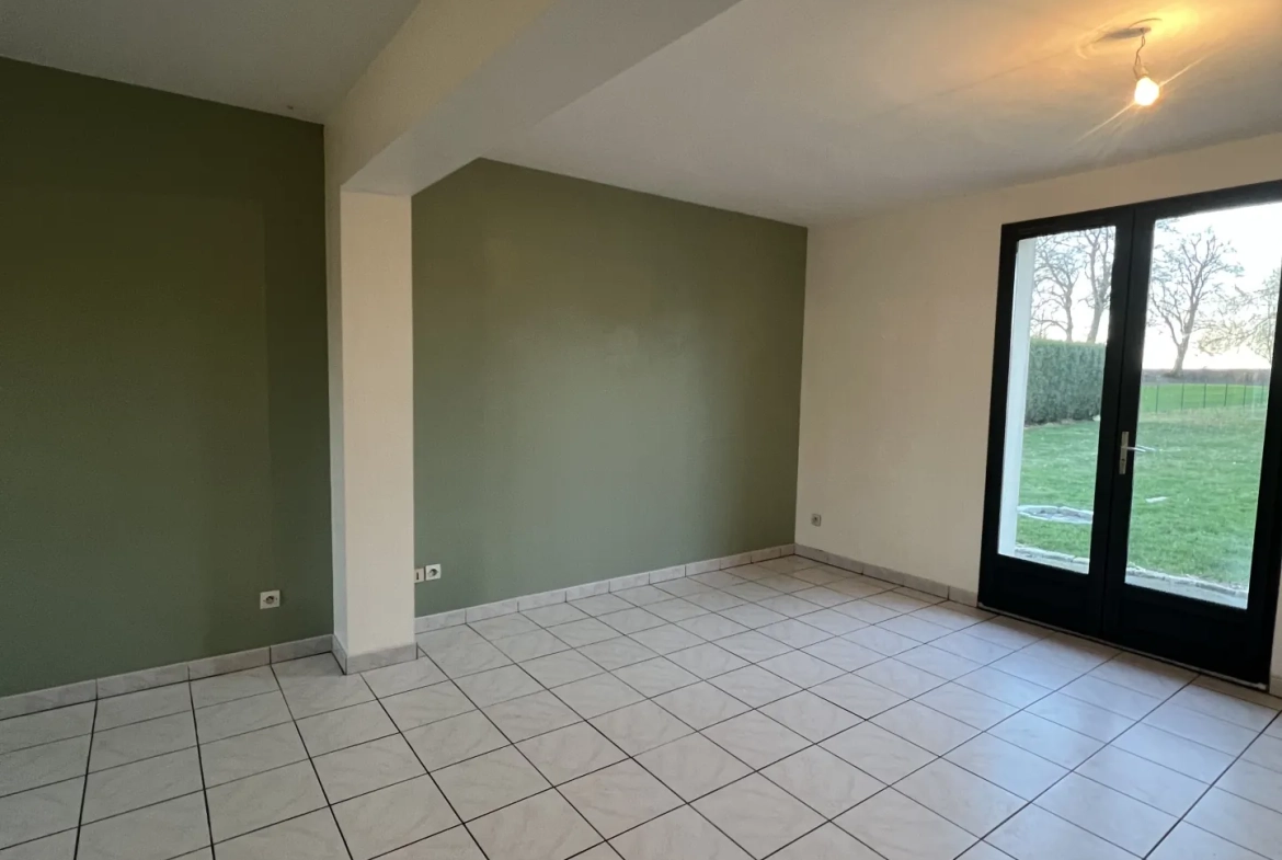 Maison individuelle à Bucquoy de 110 m² avec jardin, garages et 4 chambres - Vente dans le Pas-de-Calais 