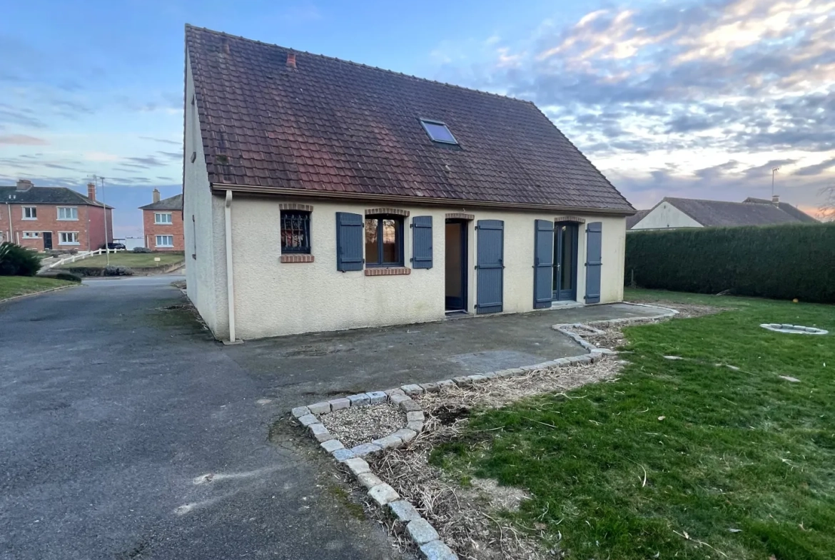 Maison individuelle à Bucquoy de 110 m² avec jardin, garages et 4 chambres - Vente dans le Pas-de-Calais 