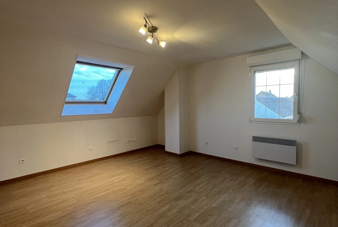 Maison individuelle à Bucquoy de 110 m² avec jardin, garages et 4 chambres - Vente dans le Pas-de-Calais 
