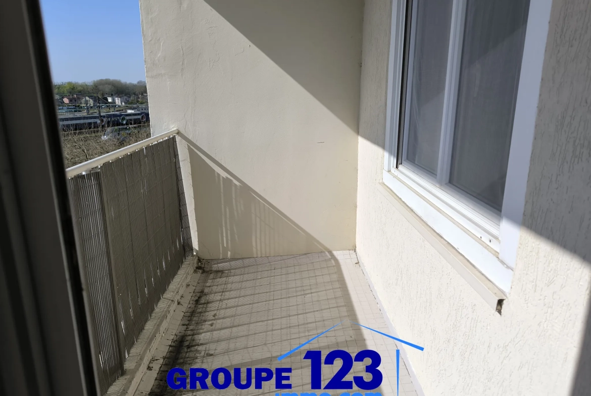 Appartement 2 chambres à Migennes – Dernier étage, parking, sécurité 