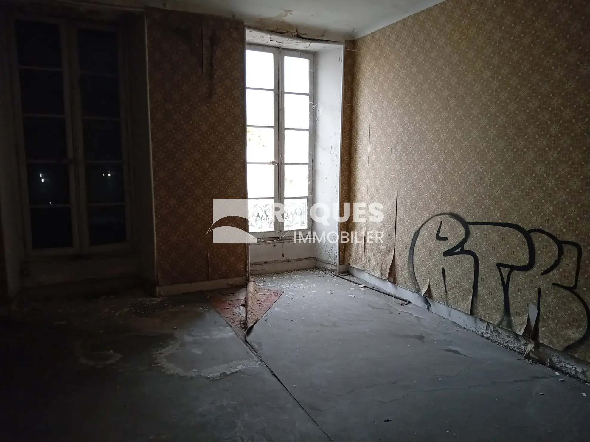 Immeuble à rénover en centre-ville de Millau - Opportunité d'investissement 