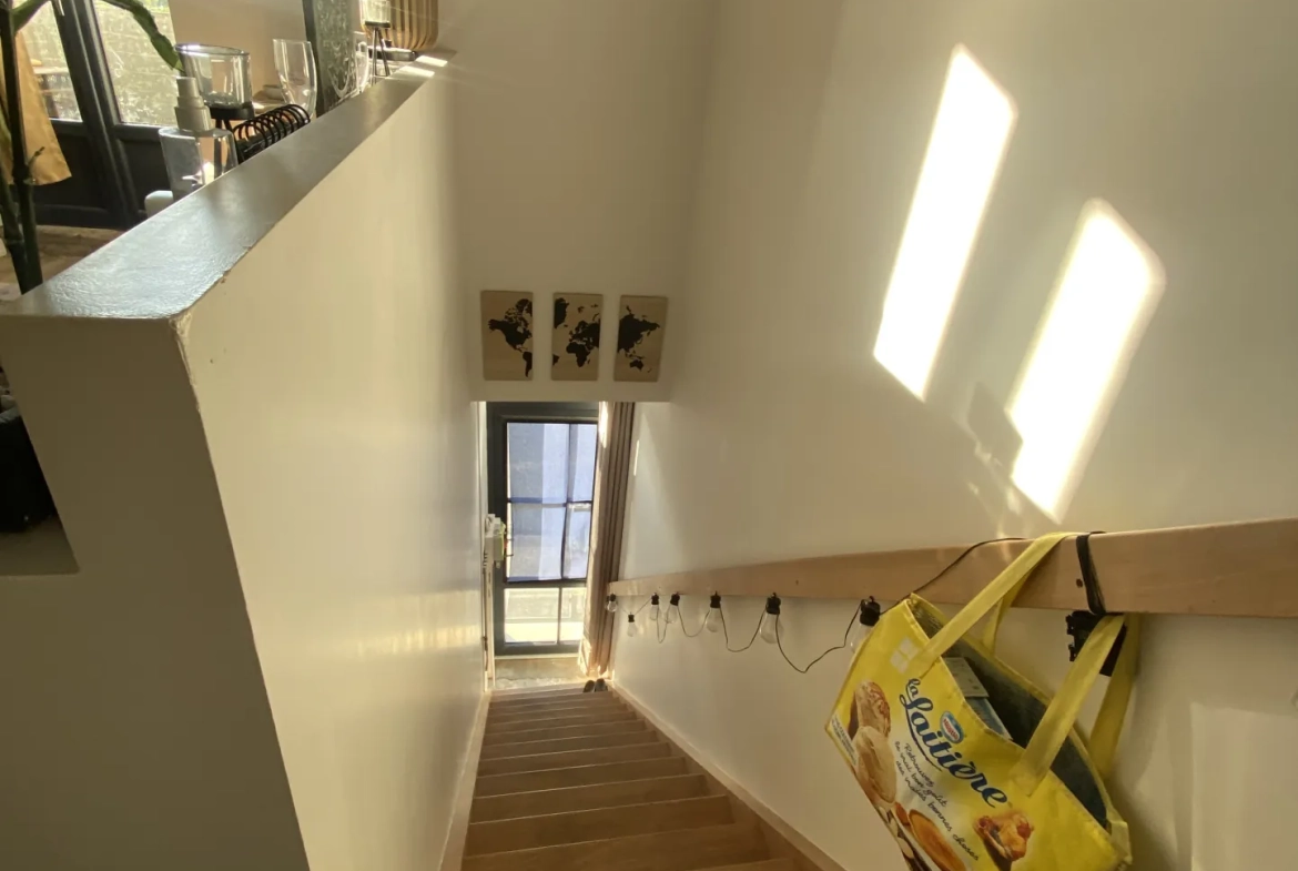 Appartement rénové à Cadillac avec jardin et stationnement - Investissement idéal 