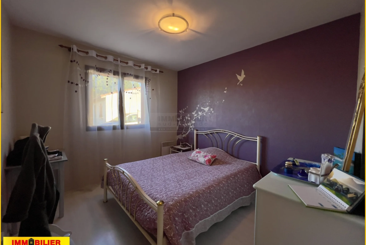 Maison familiale de plain-pied à vendre à Podensac avec grand terrain et garage 