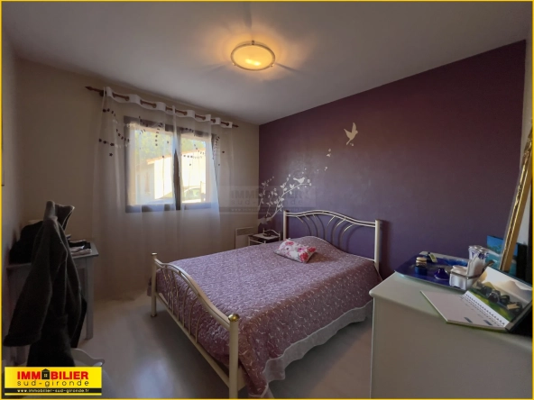 Maison familiale de plain-pied à vendre à Podensac avec grand terrain et garage 