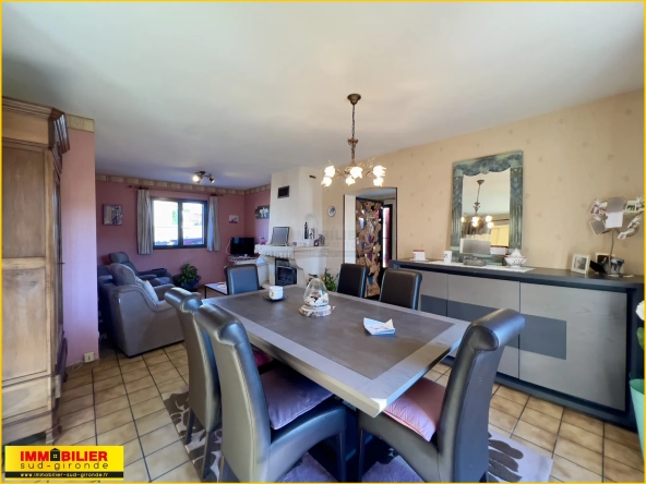 Maison familiale de plain-pied à vendre à Podensac avec grand terrain et garage 
