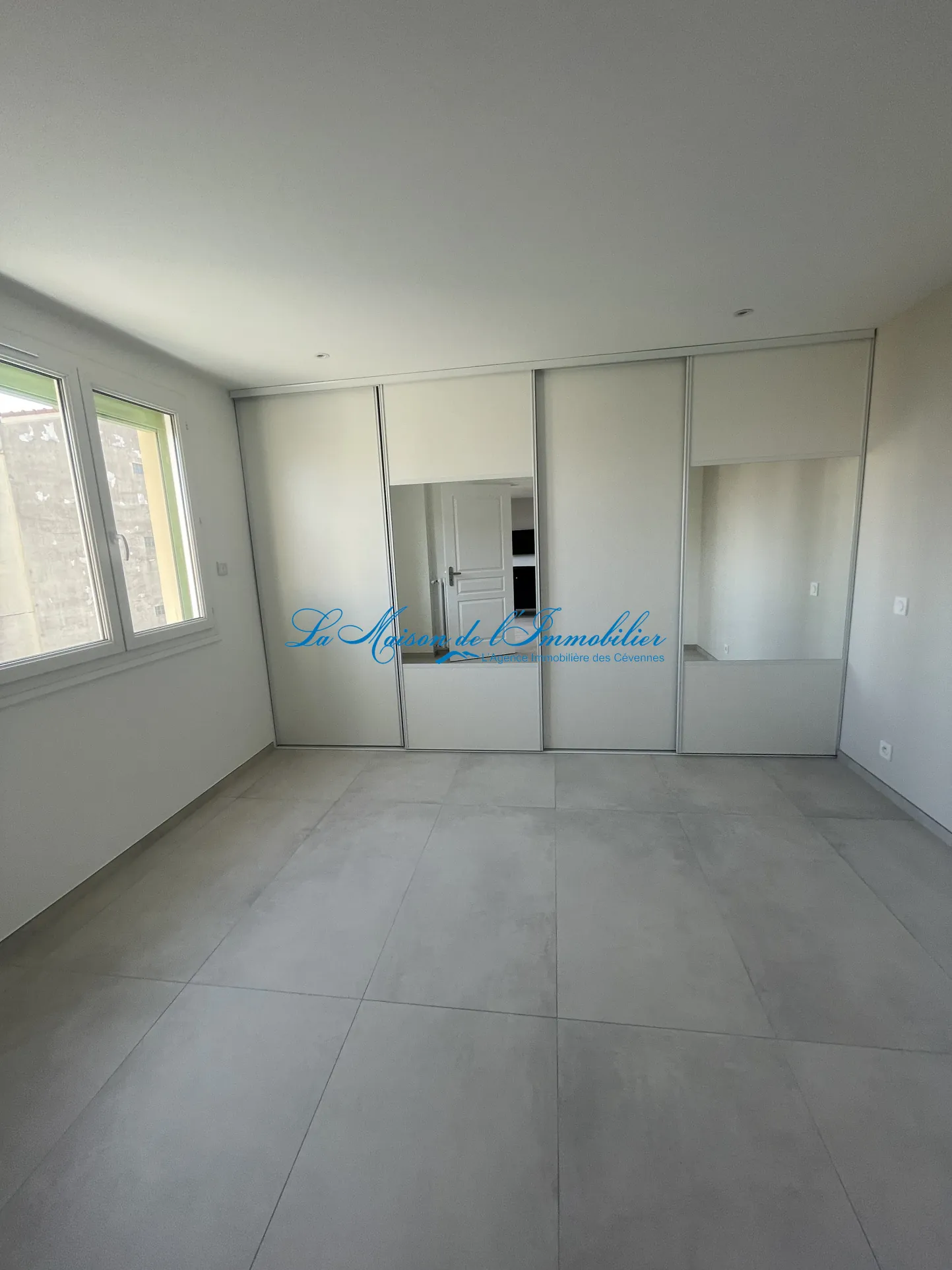 Appartement F3 rénové avec garage et balcon au cœur d’Alès 