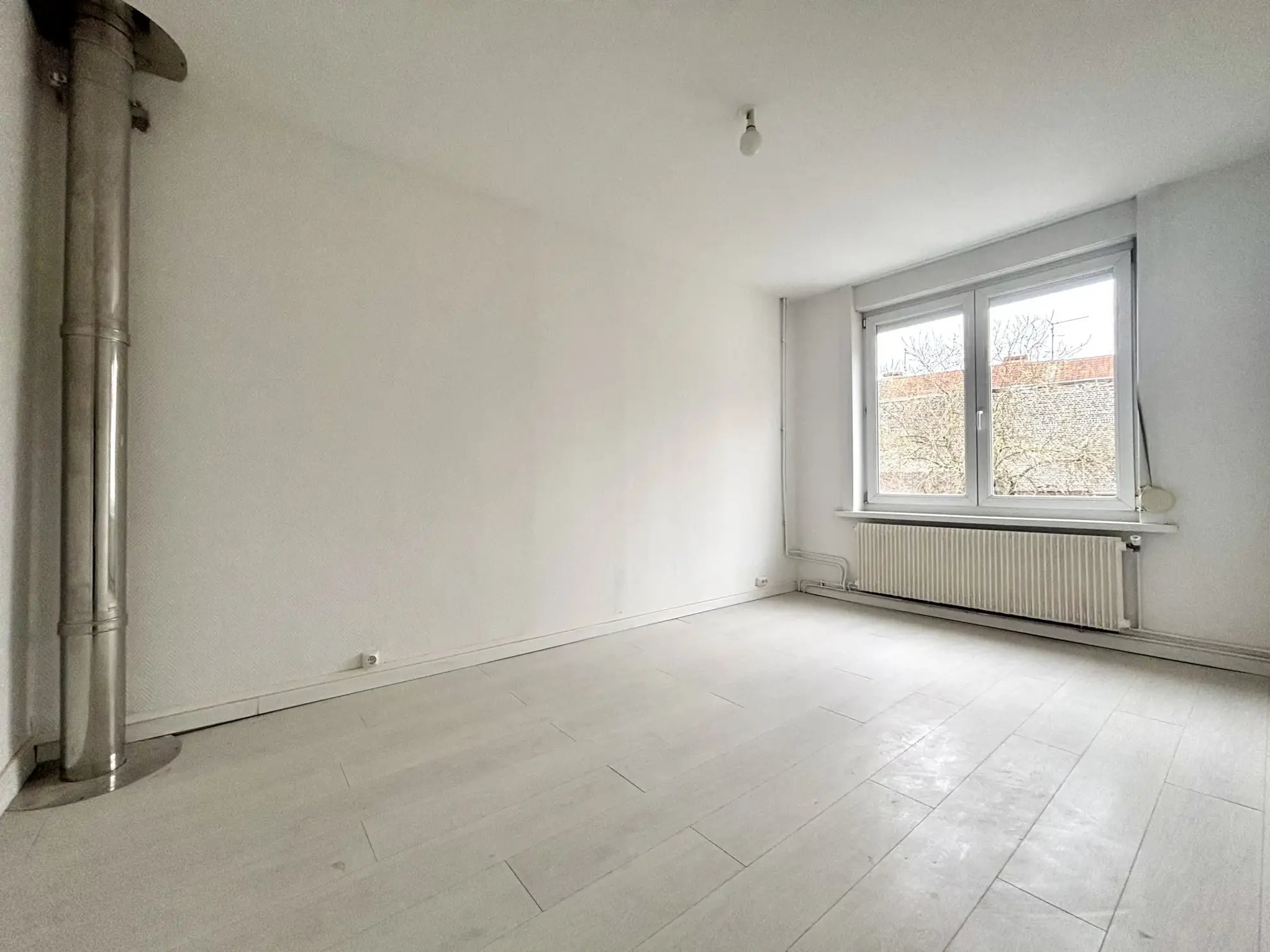 Maison lumineuse de 130m² avec 4 chambres, terrasse et cave à Roubaix 