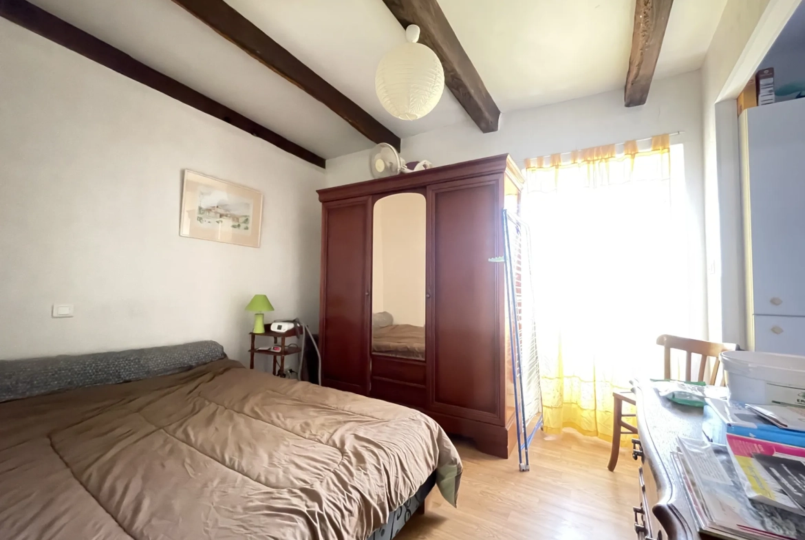 Charmante maison en pierre avec terrain à Rilhac-Xaintrie – 2 chambres, terrasse et garage 