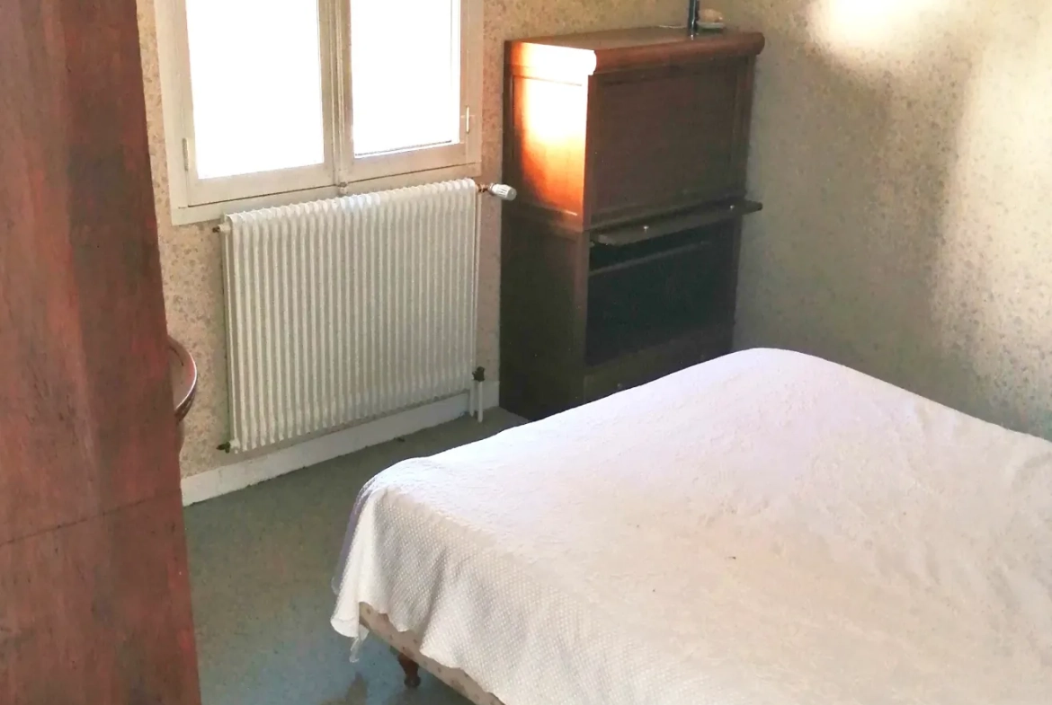 Maison spacieuse à Baume-les-Dames avec grand terrain et potentiel locatif 