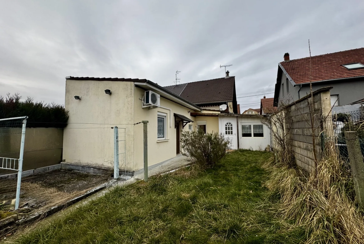 Maison mitoyenne de 143,29 m² avec dépendance, garage et jardin à Freyming-Merlebach 