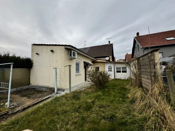 Maison mitoyenne de 143,29 m² avec dépendance, garage et jardin à Freyming-Merlebach 