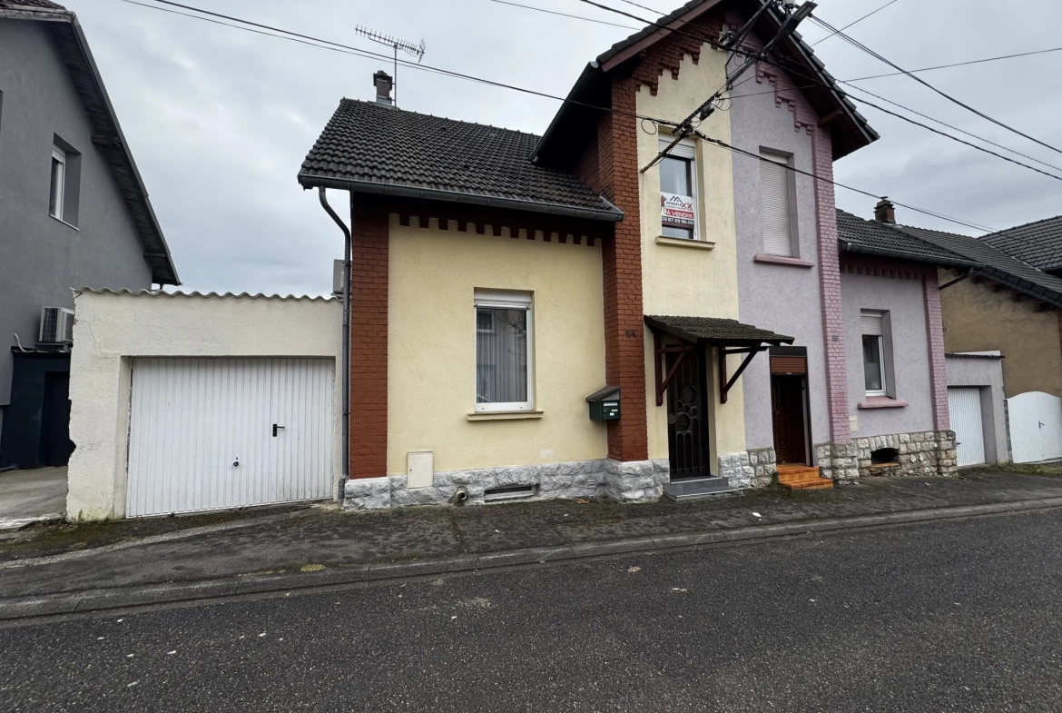 Maison mitoyenne de 143,29 m² avec dépendance, garage et jardin à Freyming-Merlebach 
