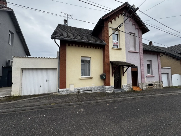 Maison mitoyenne de 143,29 m² avec dépendance, garage et jardin à Freyming-Merlebach 