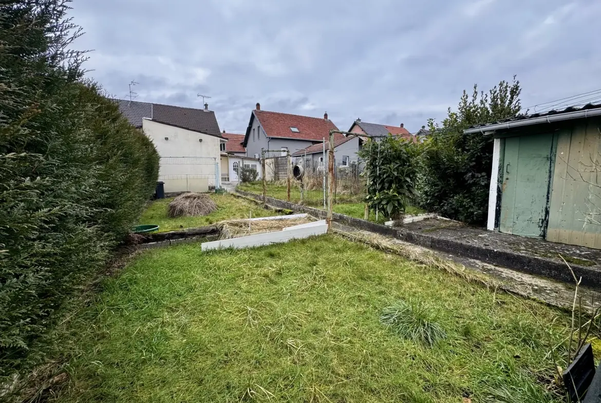 Maison mitoyenne de 143,29 m² avec dépendance, garage et jardin à Freyming-Merlebach 