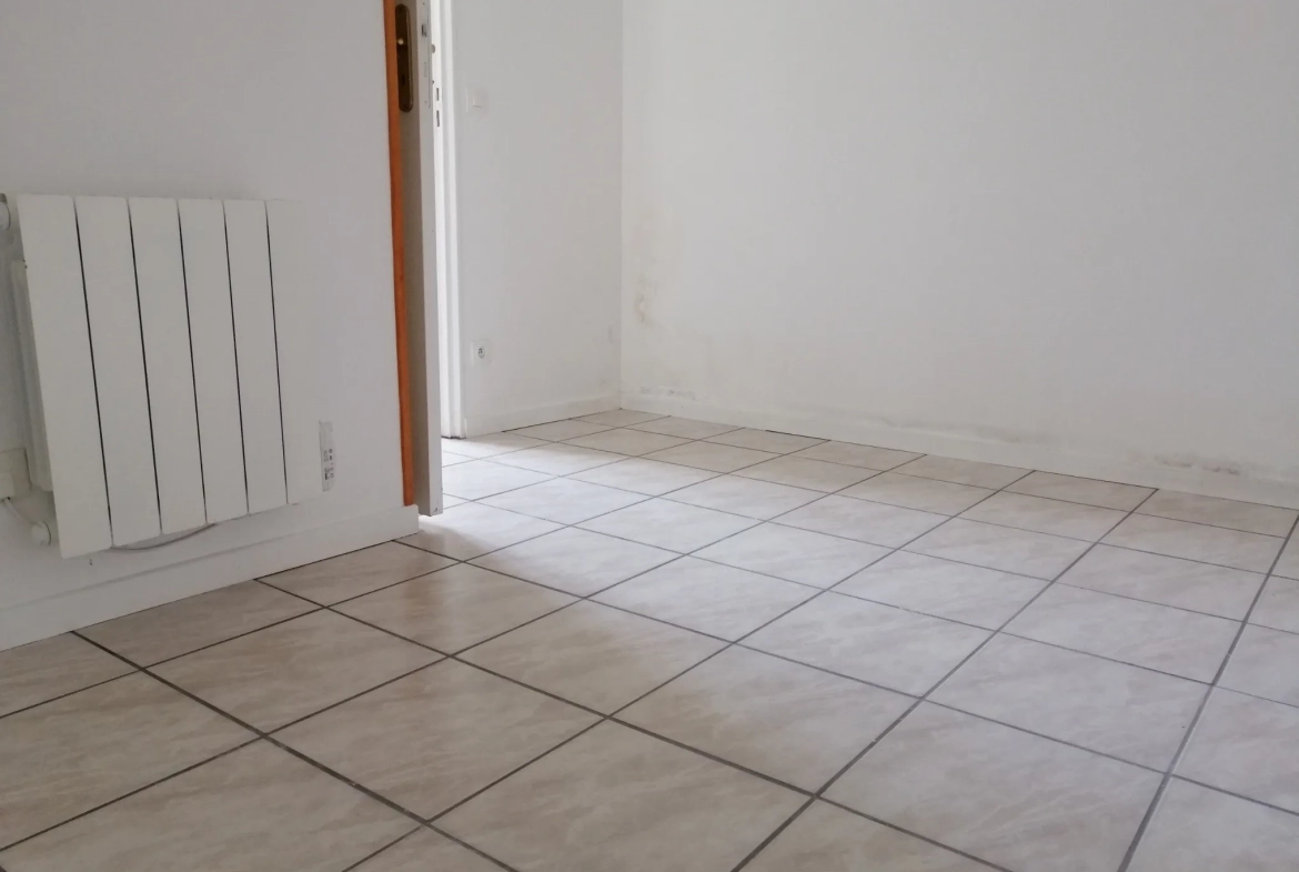 Immeuble rénové à Nevers avec 4 logements et jardin – Opportunité d'investissement 