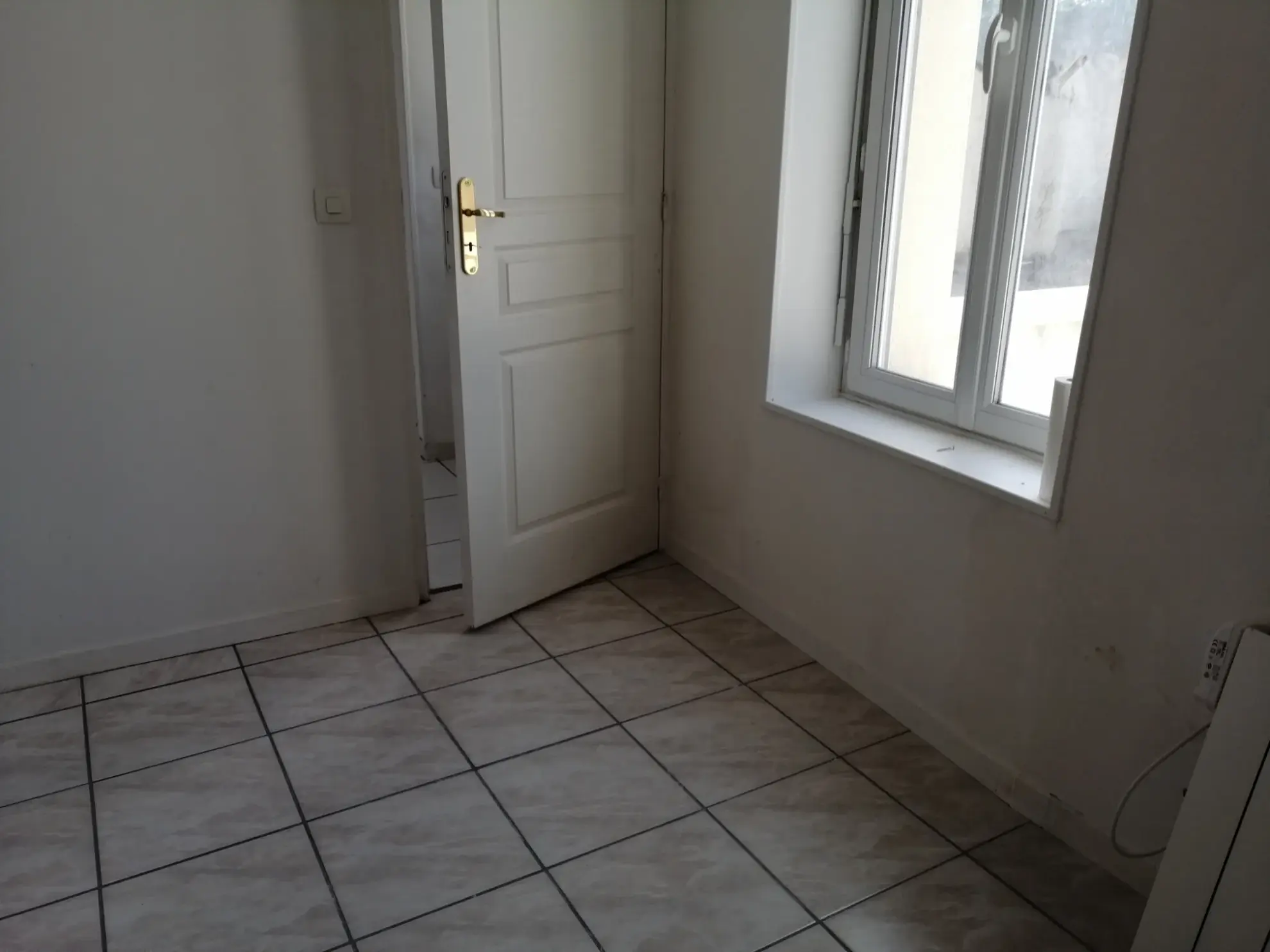 Immeuble rénové à Nevers avec 4 logements et jardin – Opportunité d'investissement 