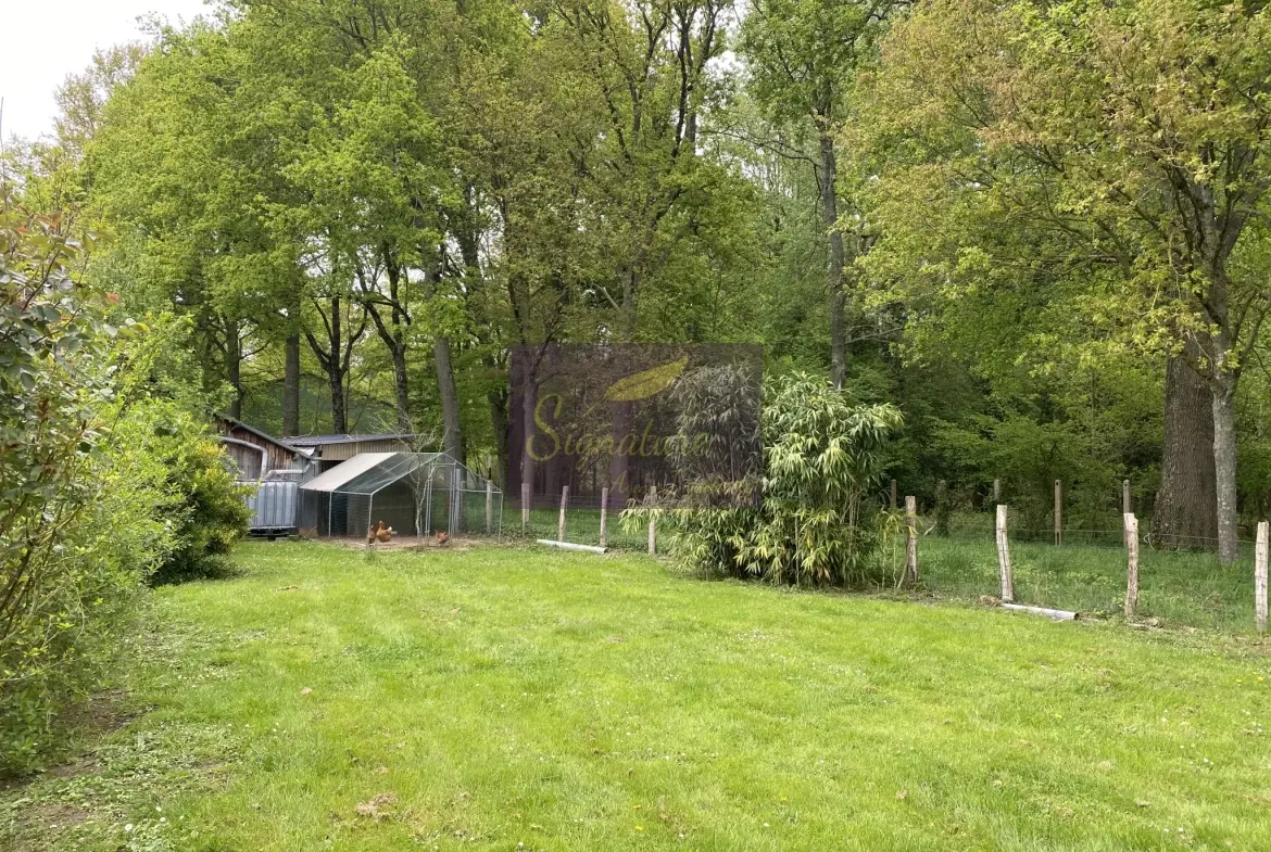 Maison à vendre à Change avec terrain de 4200 m², garage, bureau et cheminée 