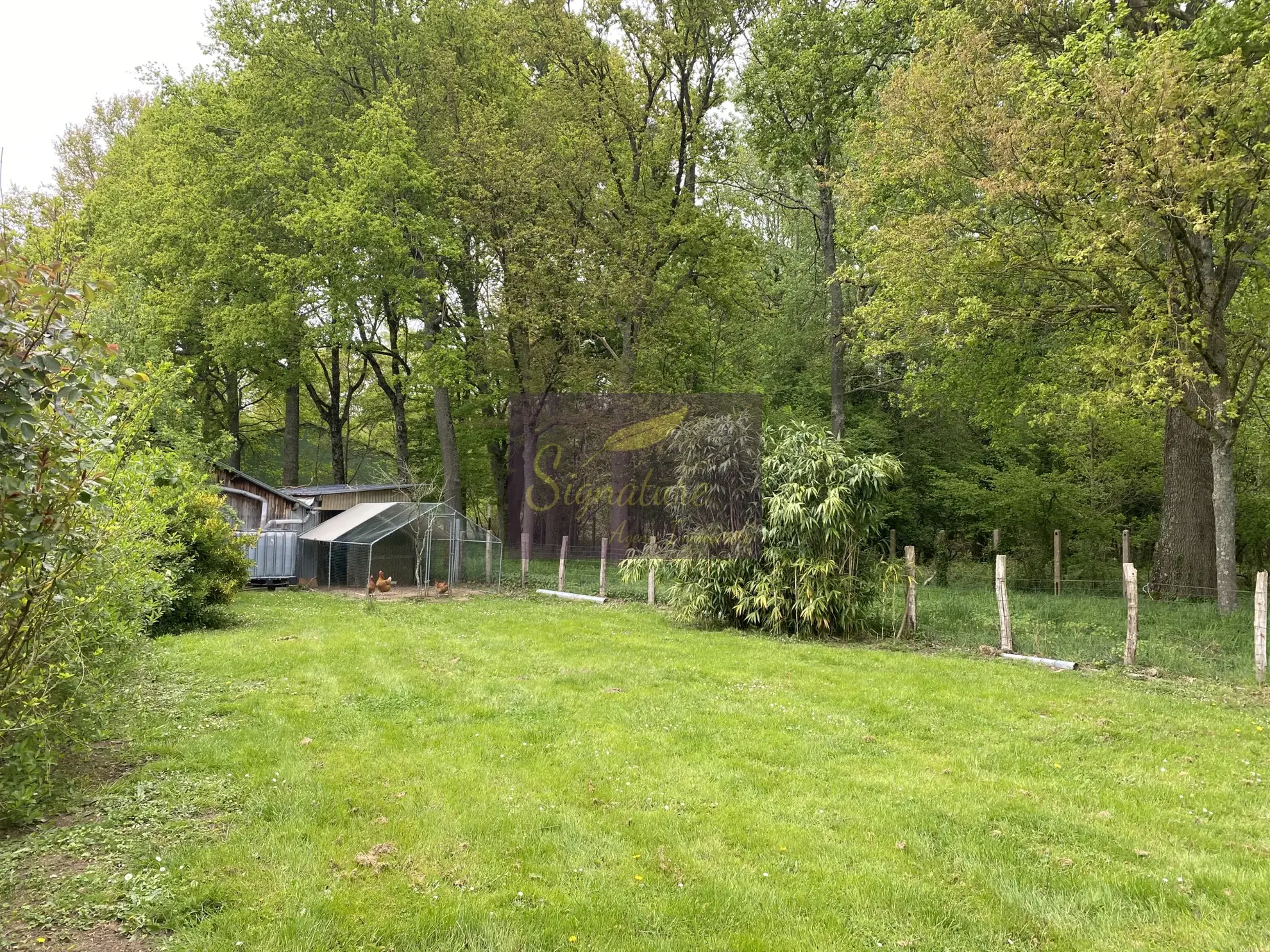 Maison à vendre à Change avec terrain de 4200 m², garage, bureau et cheminée 