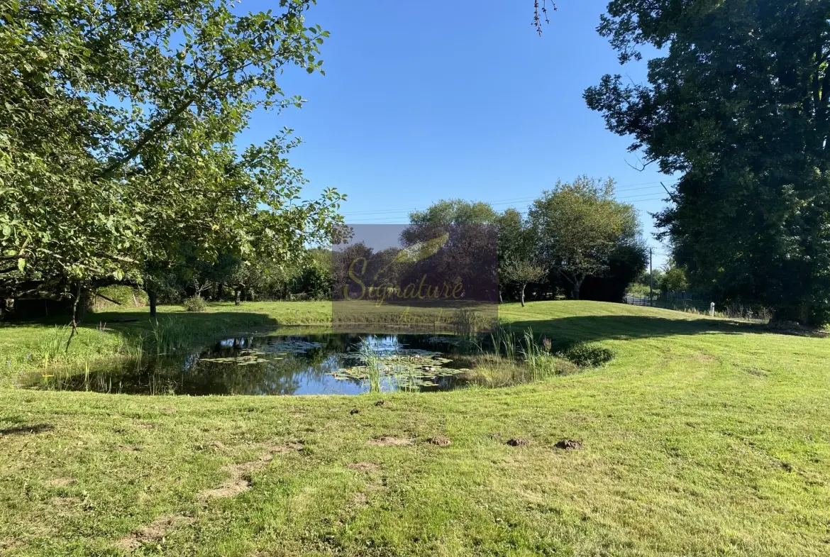 Maison à vendre à Change avec terrain de 4200 m², garage, bureau et cheminée 