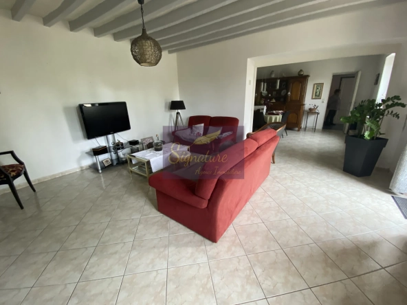Maison à vendre à Change avec terrain de 4200 m², garage, bureau et cheminée 