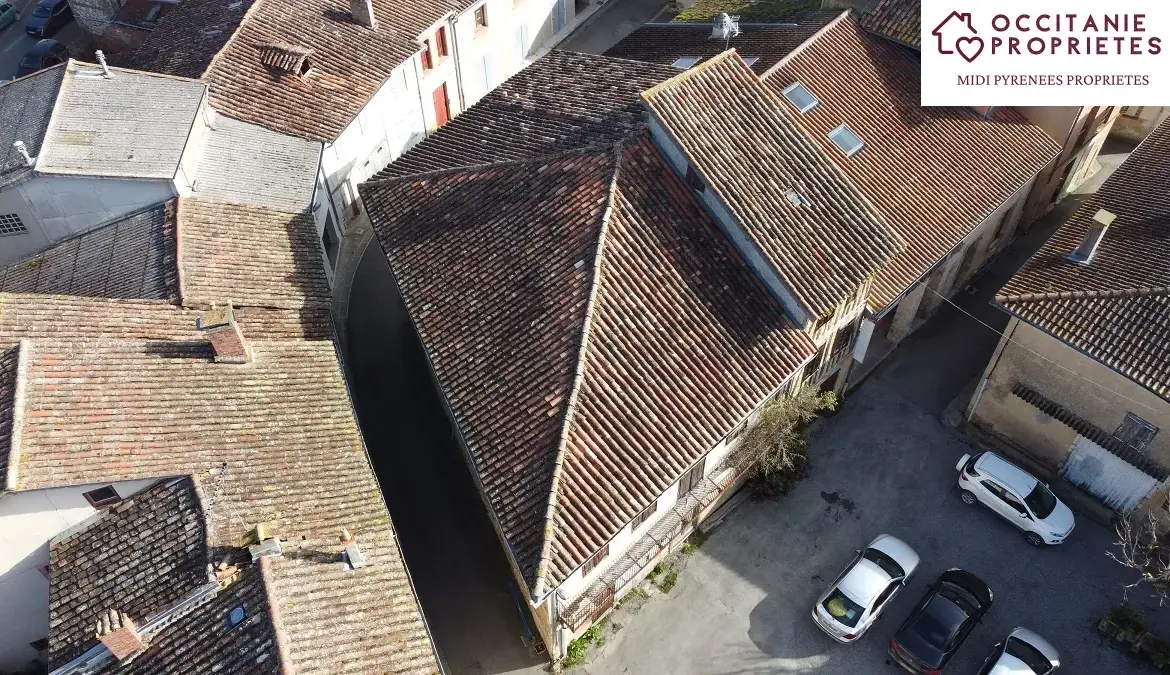 Entrepôt à transformer en immeuble locatif au centre-ville de L'Isle-en-Dodon 