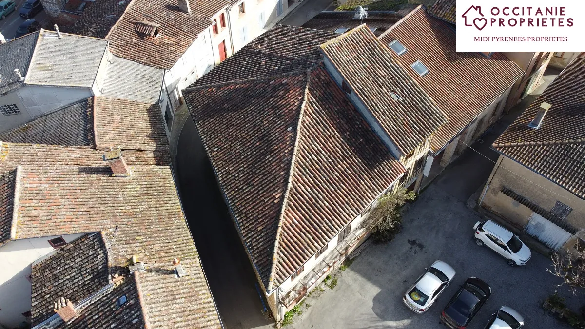 Entrepôt à transformer en immeuble locatif au centre-ville de L'Isle-en-Dodon 