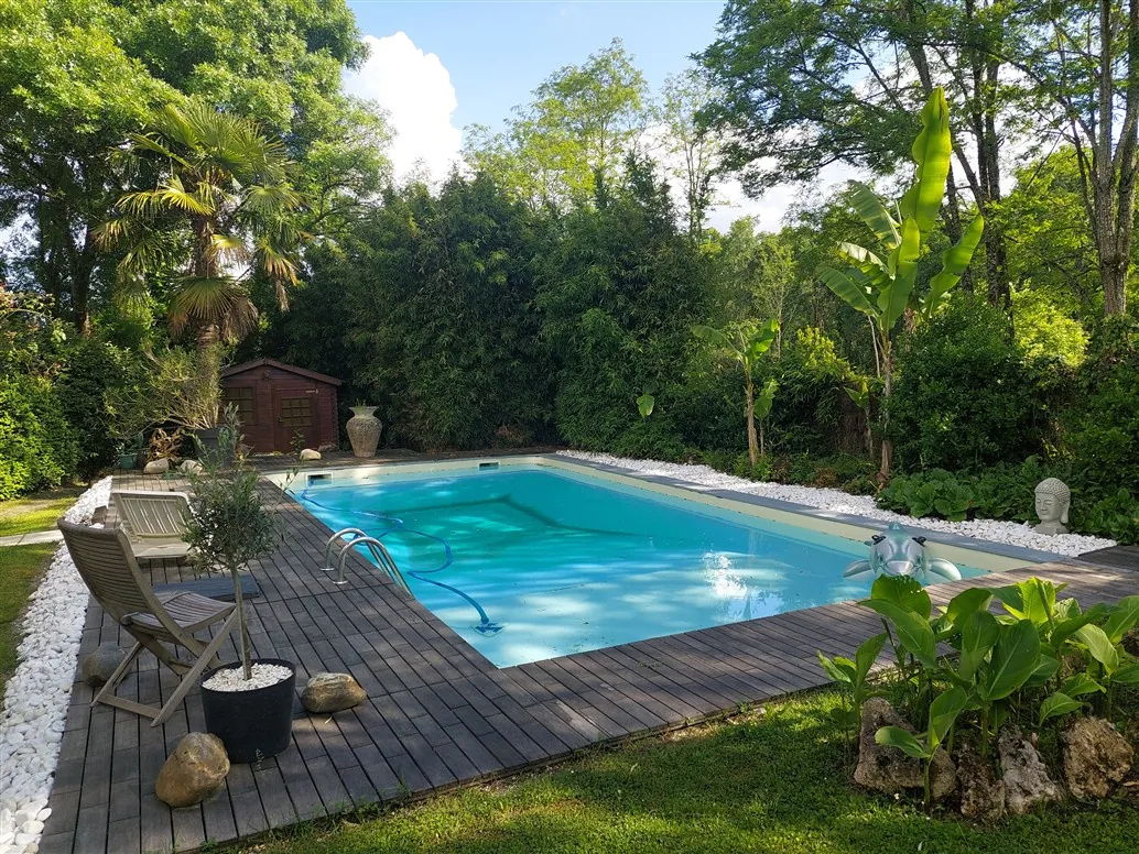 Maison à vendre de 135 m² avec piscine et terrain arboré à Budos, proche Illats 