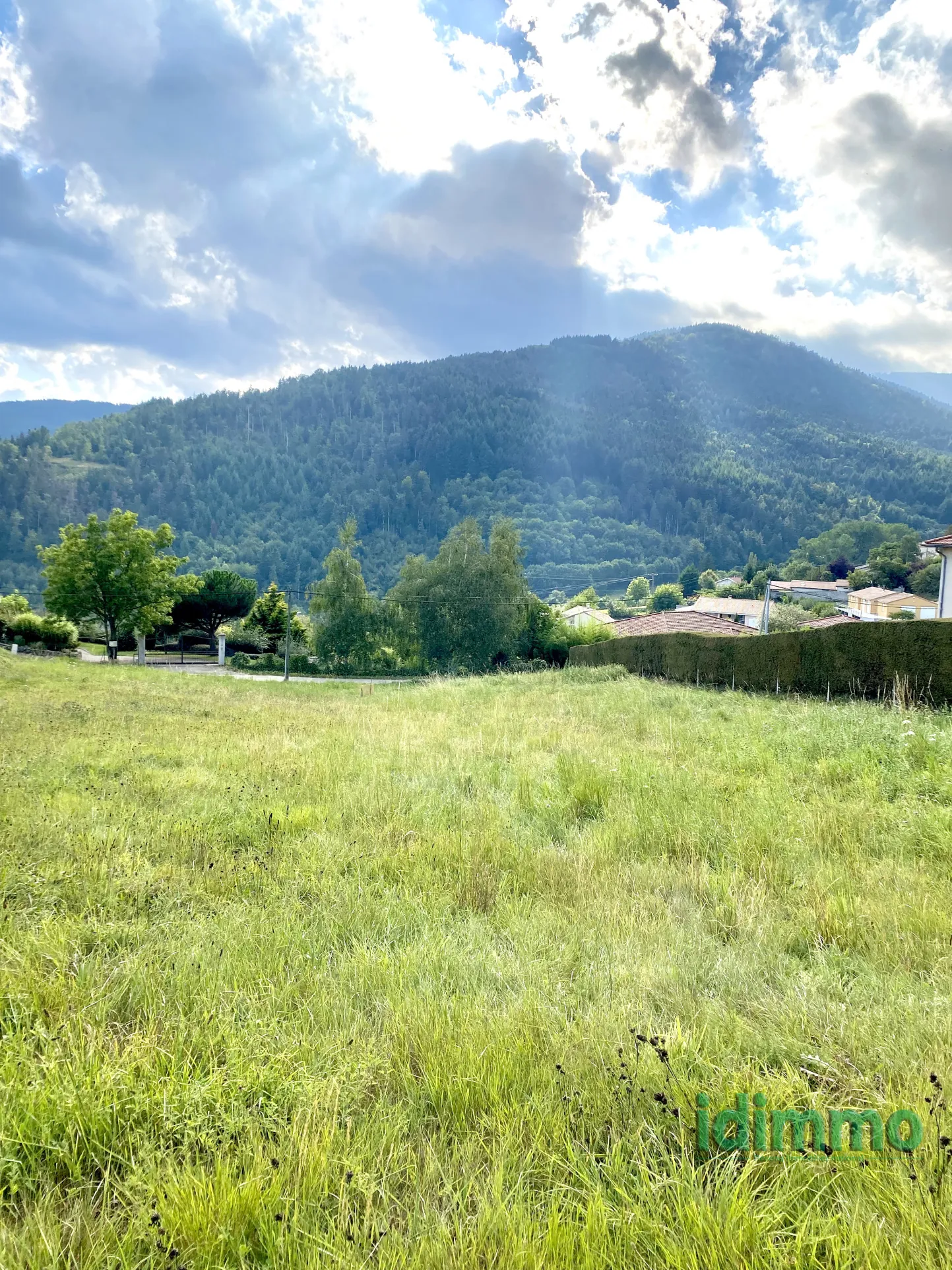 Terrain de 1752 m² à Vanosc avec vue, proche du village 