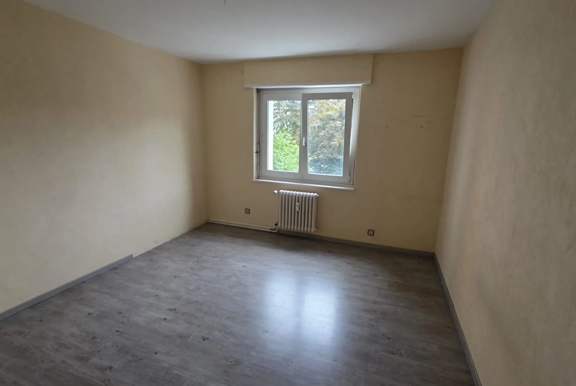 Appartement T4 à Mulhouse de 69 m² avec balcon, idéalement situé 
