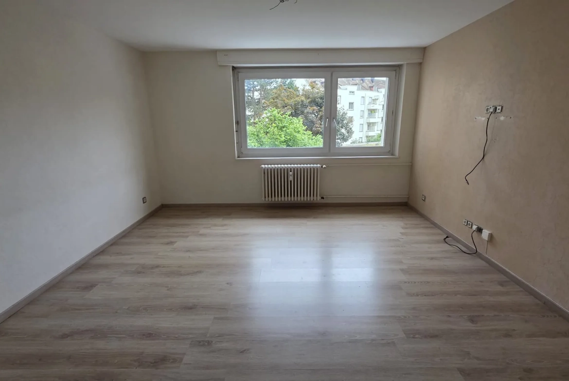 Appartement T4 à Mulhouse de 69 m² avec balcon, idéalement situé 