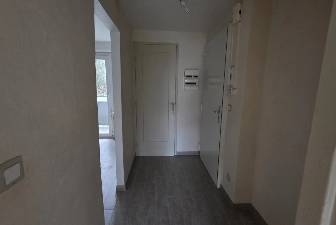 Appartement T4 à Mulhouse de 69 m² avec balcon, idéalement situé 