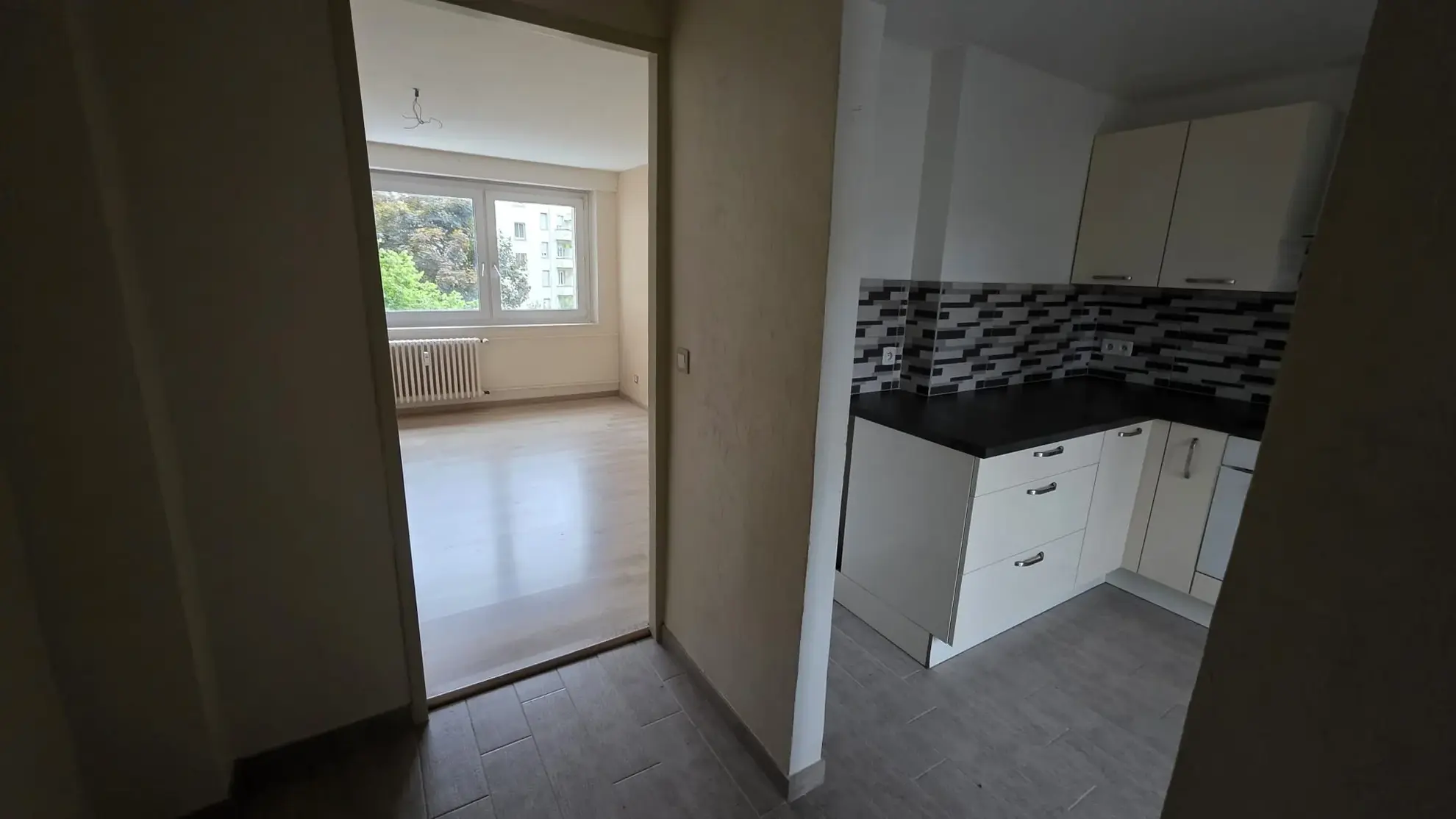 Appartement T4 à Mulhouse de 69 m² avec balcon, idéalement situé 