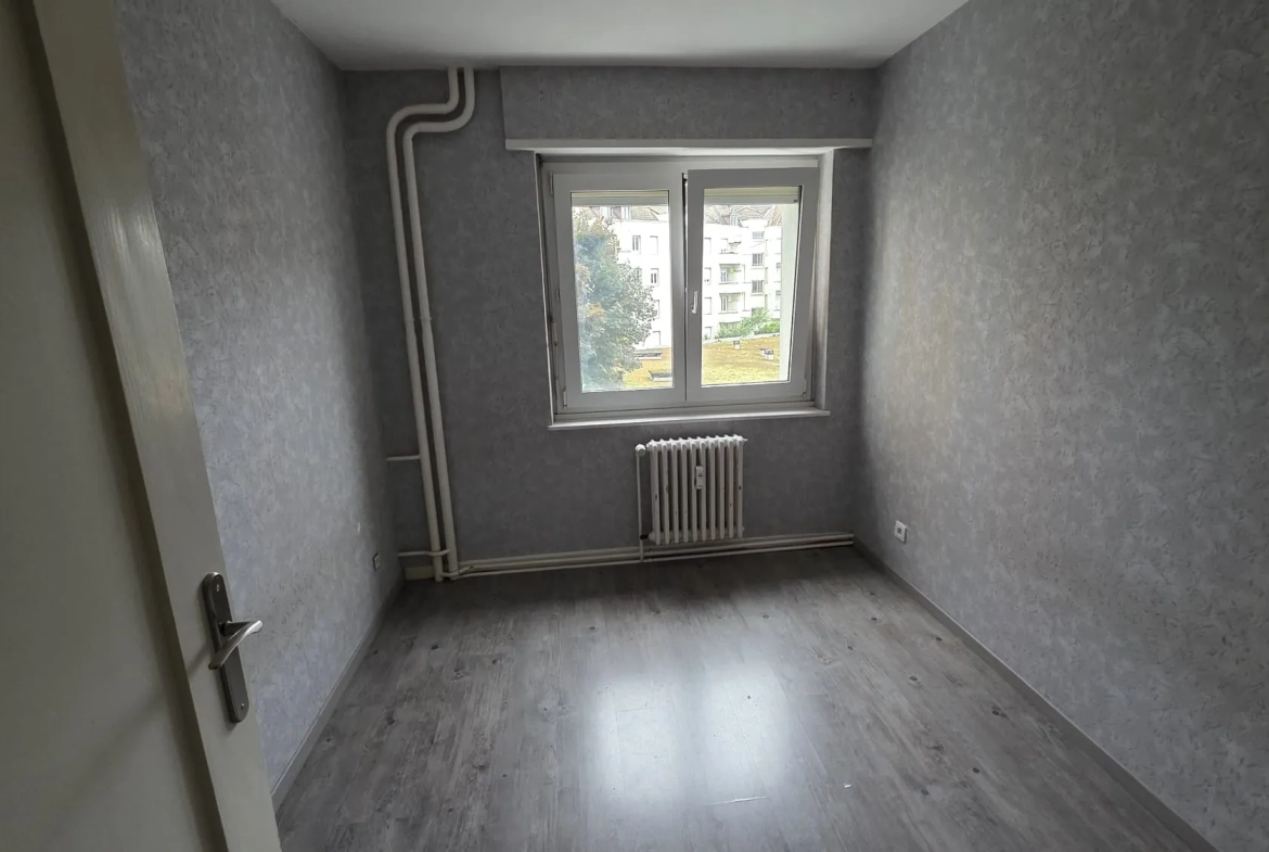 Appartement T4 à Mulhouse de 69 m² avec balcon, idéalement situé 