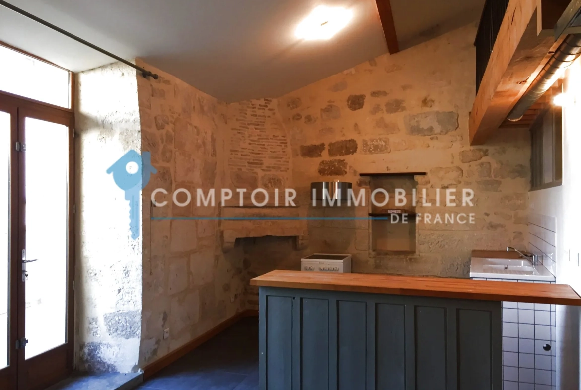 Immeuble de rapport à vendre à Beaucaire avec 4 appartements et 2 garages - Opportunité d'investissement 