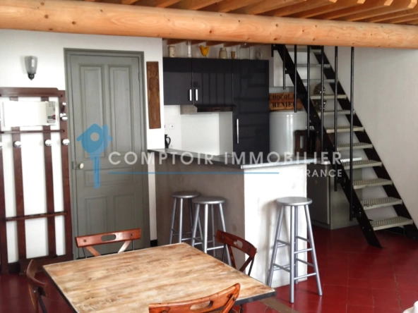 Immeuble de rapport à vendre à Beaucaire avec 4 appartements et 2 garages - Opportunité d'investissement