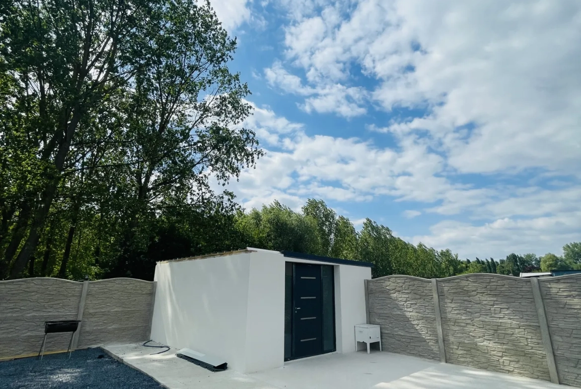 Maison neuve de plain-pied avec garage et annexe à Grugies 