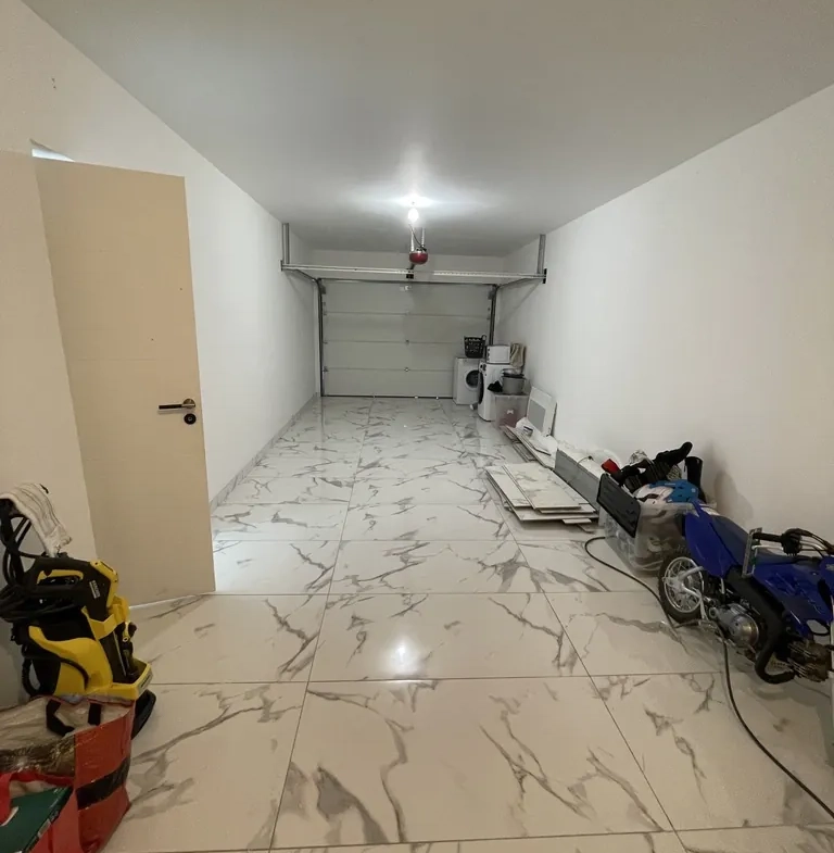 Maison neuve de plain-pied avec garage et annexe à Grugies 