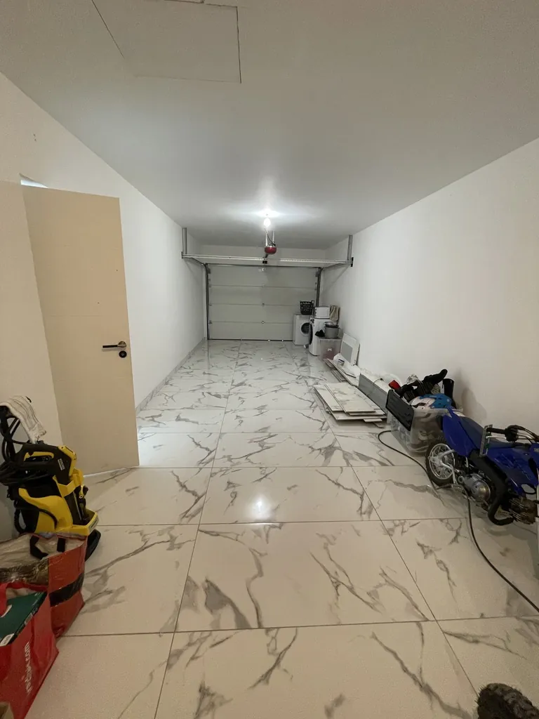 Maison neuve de plain-pied avec garage et annexe à Grugies 