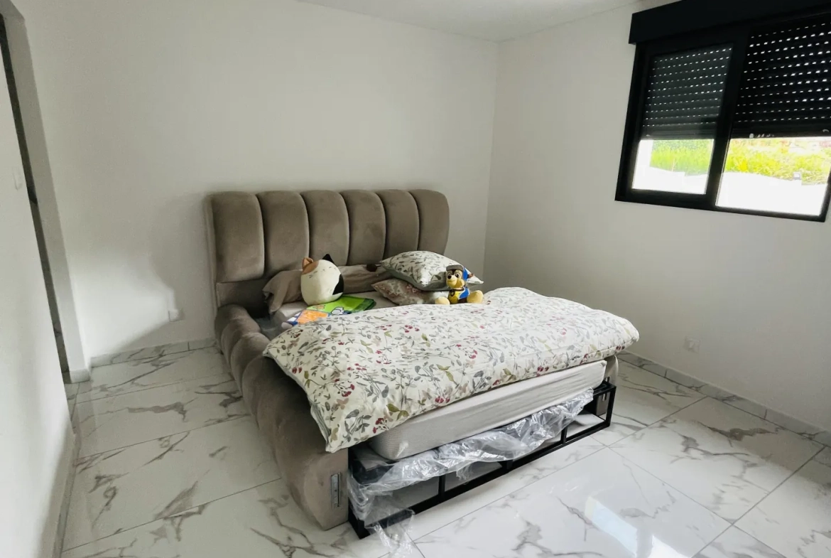 Maison neuve de plain-pied avec garage et annexe à Grugies 