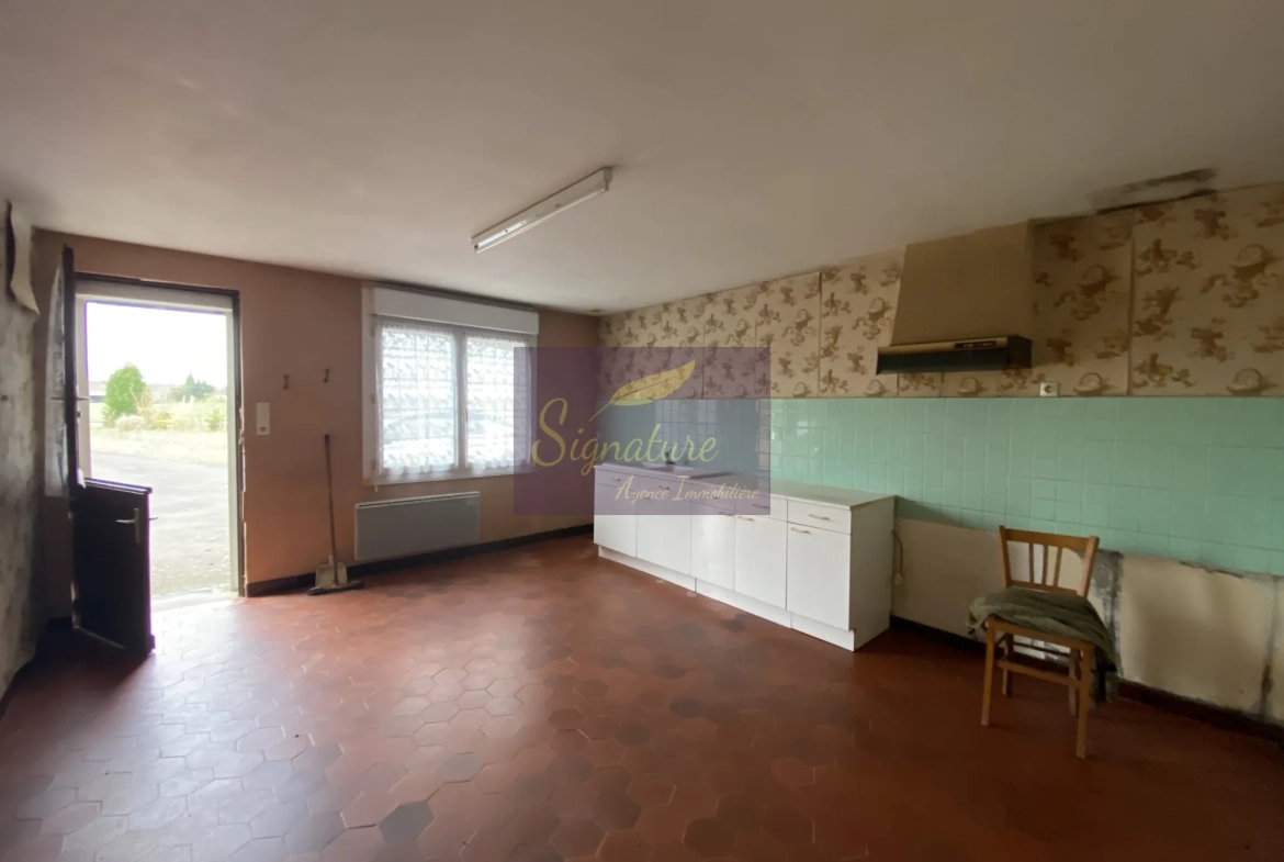 Maison de plain-pied avec terrain constructible à Change (72560) 