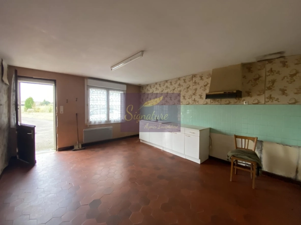 Maison de plain-pied avec terrain constructible à Change (72560) 