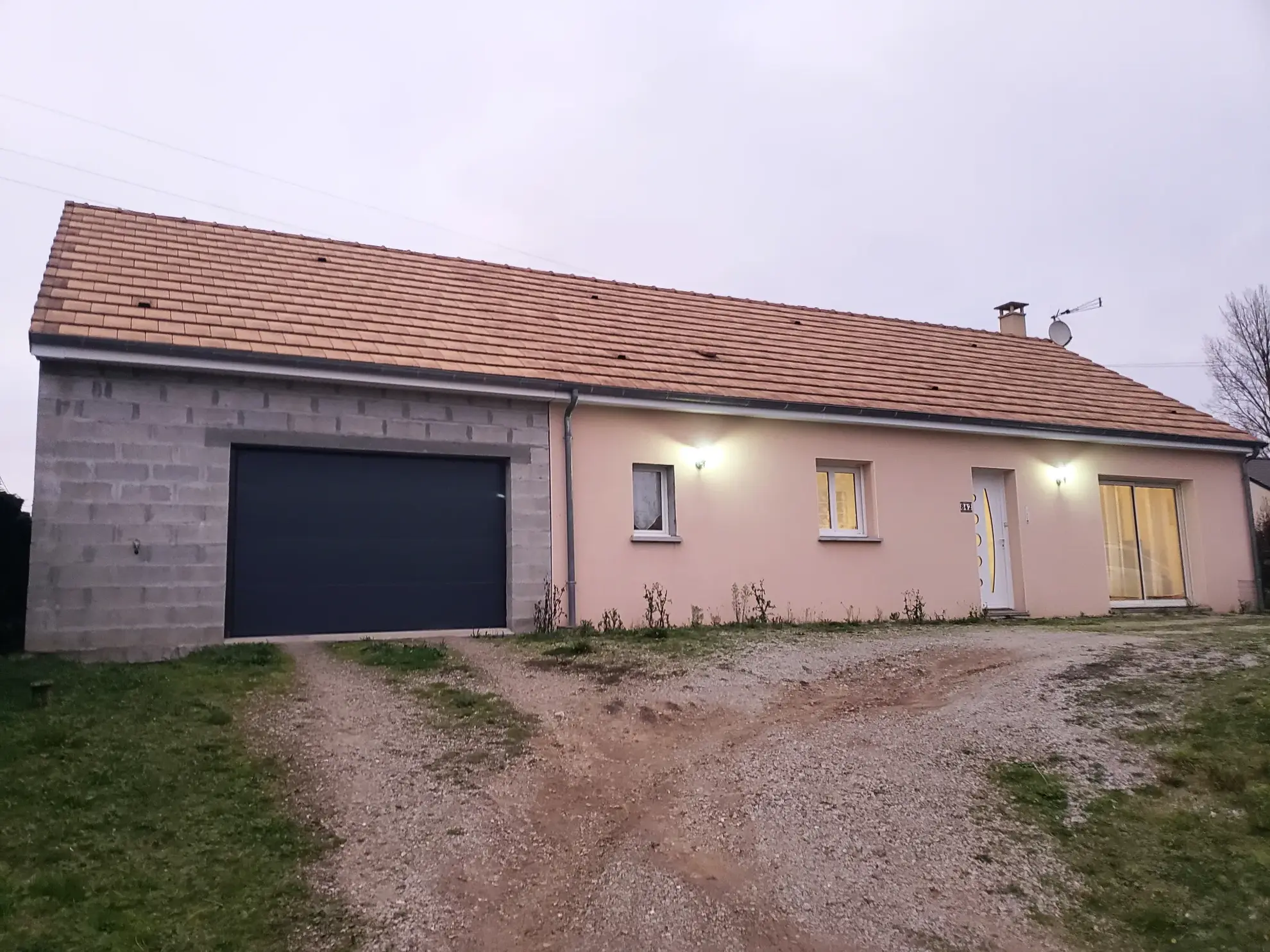 Maison de plain-pied récente de 94 m² avec garage à l'Aigle 
