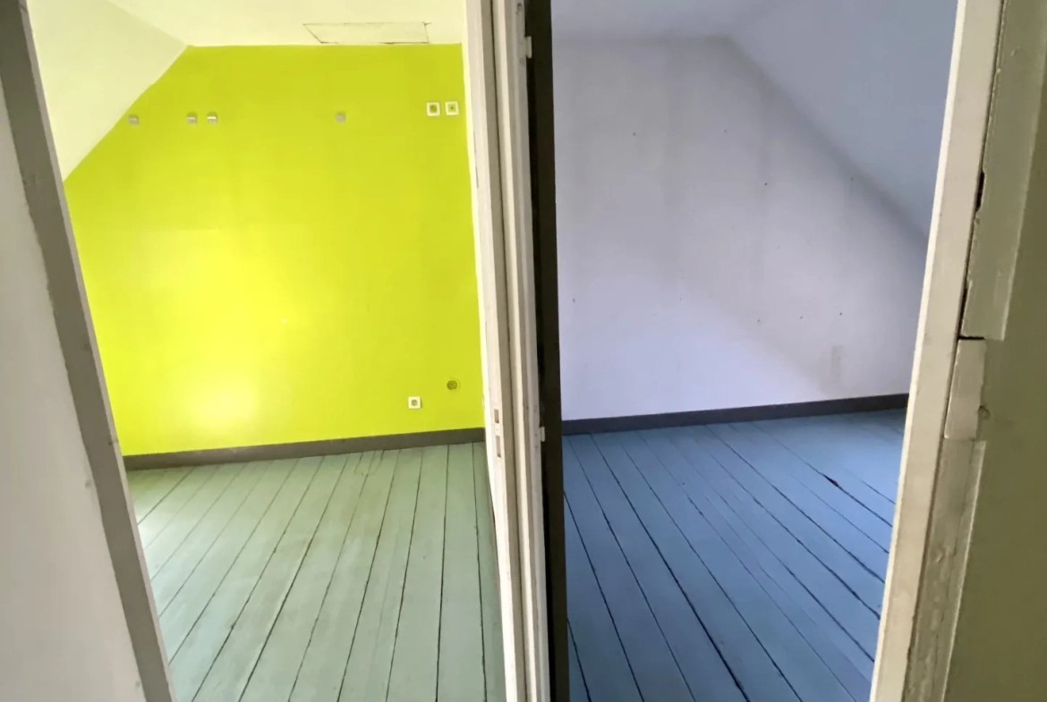 Maison semi-individuelle à Maubeuge avec garage et terrain à rénover 