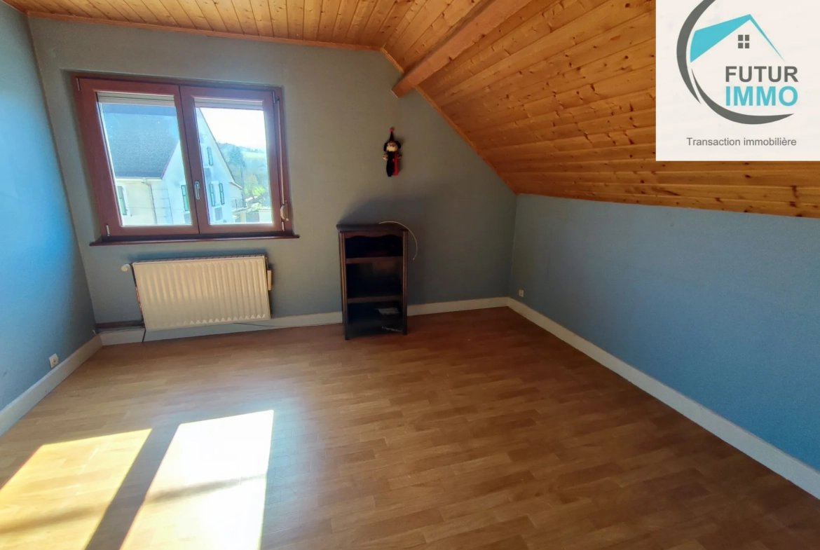 Maison accolée de 95 m² à Dasle avec garage et terrain clos 