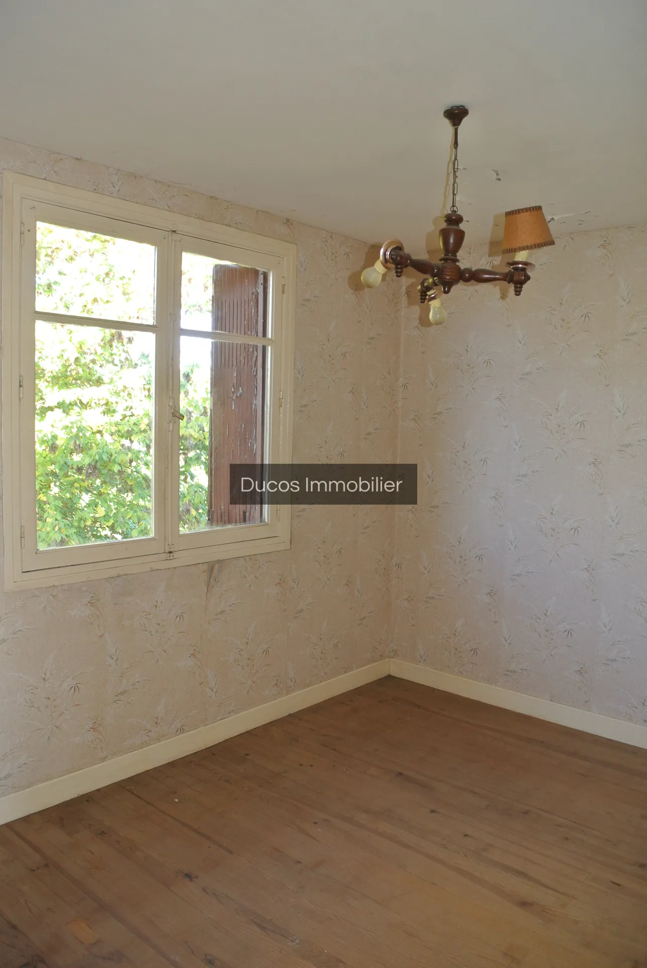 Maison à rénover avec jardin et garage à Marmande 